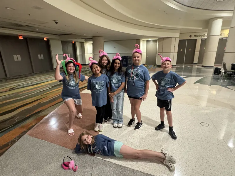 Longleaf OM team with flamingo headbands